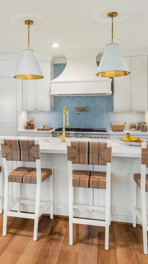 Blue tile kitchen design by Aurora Fain